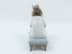 Bild von Lladro Porzellanfigur sitzendes Mädchen. nichts zu tun, Modellnummer 5649